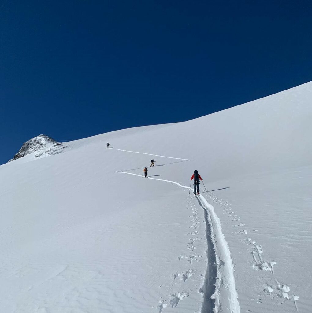 Keeping a safe distance apart whilst splitboard touring in potential avalanche terrain